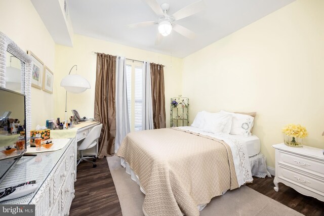 34851 Surfsong Lndg, Millville, DE 19967 - bedroom featuring a ceiling fan and dark wood-style flooring