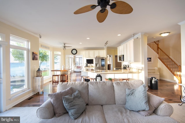 520 Bayside Dr, Stevensville, MD 21666 - living room with wood finished floors, crown molding, and ceiling fan