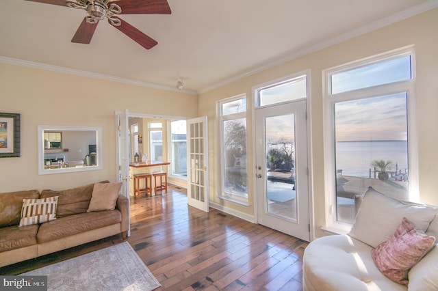 520 Bayside Dr, Stevensville, MD 21666 - living room featuring a ceiling fan, hardwood / wood-style flooring, and ornamental molding