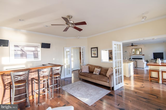 520 Bayside Dr, Stevensville, MD 21666 - living area featuring a ceiling fan, ornamental molding, and french doors