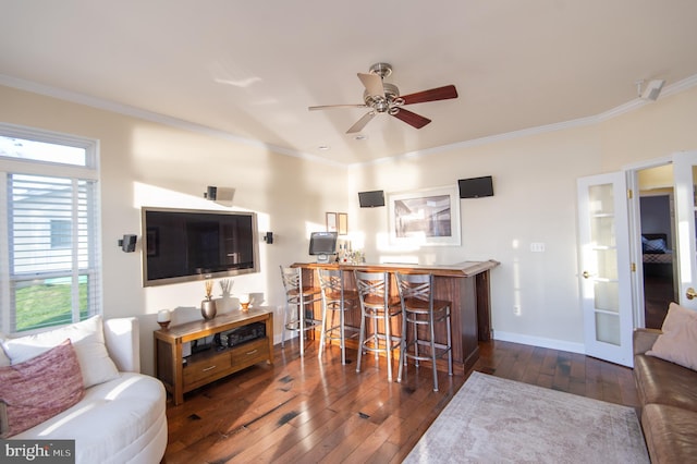 520 Bayside Dr, Stevensville, MD 21666 - living area with crown molding, hardwood / wood-style flooring, ceiling fan, french doors, and baseboards