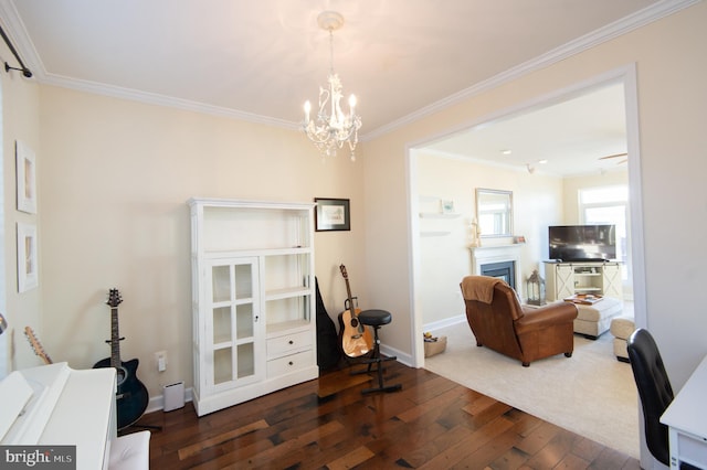 520 Bayside Dr, Stevensville, MD 21666 - office space featuring crown molding, a chandelier, a fireplace, baseboards, and dark wood-type flooring