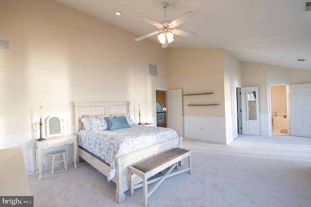 520 Bayside Dr, Stevensville, MD 21666 - bedroom featuring lofted ceiling, light carpet, a wainscoted wall, and visible vents