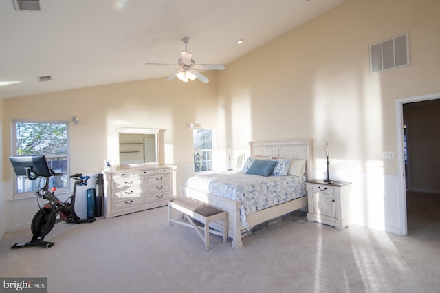 520 Bayside Dr, Stevensville, MD 21666 - bedroom featuring a wainscoted wall, visible vents, high vaulted ceiling, and ceiling fan