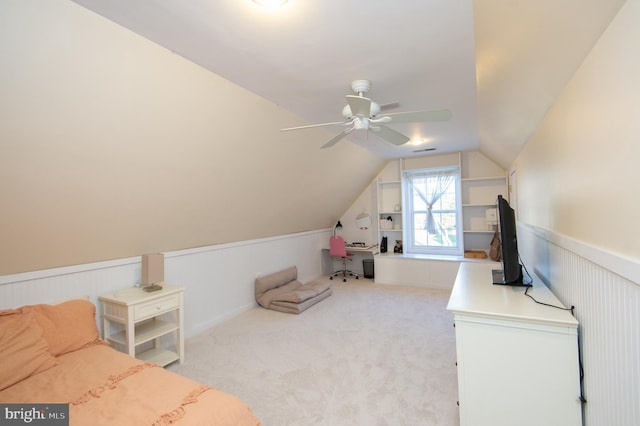 520 Bayside Dr, Stevensville, MD 21666 - interior space featuring vaulted ceiling, visible vents, a wainscoted wall, and ceiling fan