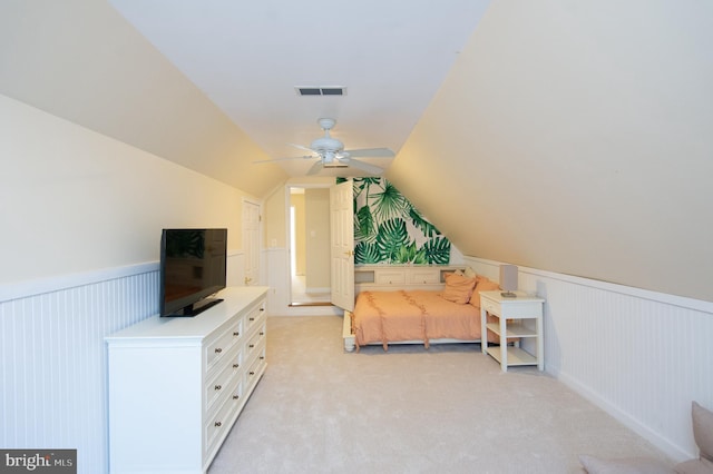 520 Bayside Dr, Stevensville, MD 21666 - bedroom with ceiling fan, a wainscoted wall, light colored carpet, lofted ceiling, and visible vents