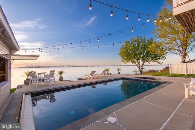 520 Bayside Dr, Stevensville, MD 21666 - view of pool featuring fence, a patio area, a fenced in pool, and a water view