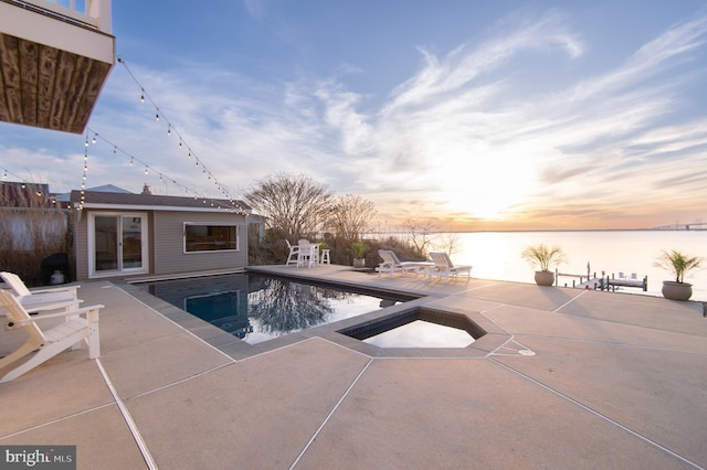 520 Bayside Dr, Stevensville, MD 21666 - pool with fence, a storage structure, a water view, an outdoor structure, and a patio