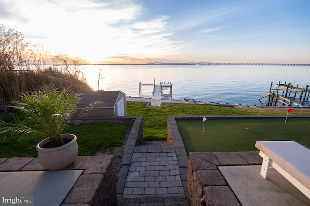 520 Bayside Dr, Stevensville, MD 21666 - view of dock with a lawn, boat lift, and a water view