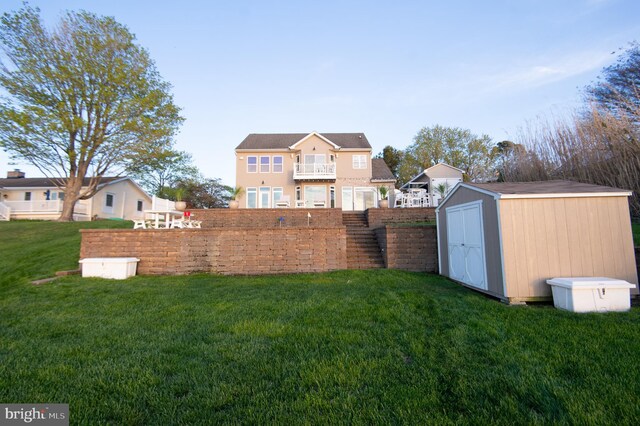 520 Bayside Dr, Stevensville, MD 21666 - view of yard with fence, an outbuilding, and a storage shed
