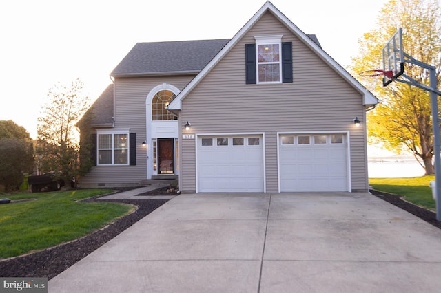 520 Bayside Dr, Stevensville, MD 21666 - traditional-style house with roof with shingles, driveway, a front yard, and a garage