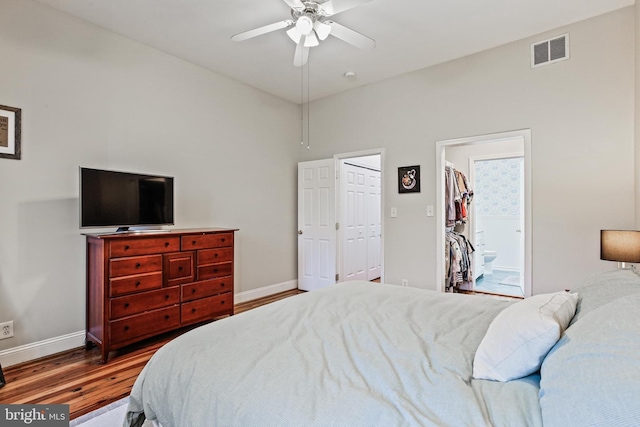 268 S E Ave, Baltimore, MD 21224 - bedroom featuring wood finished floors, a ceiling fan, and ensuite bath
