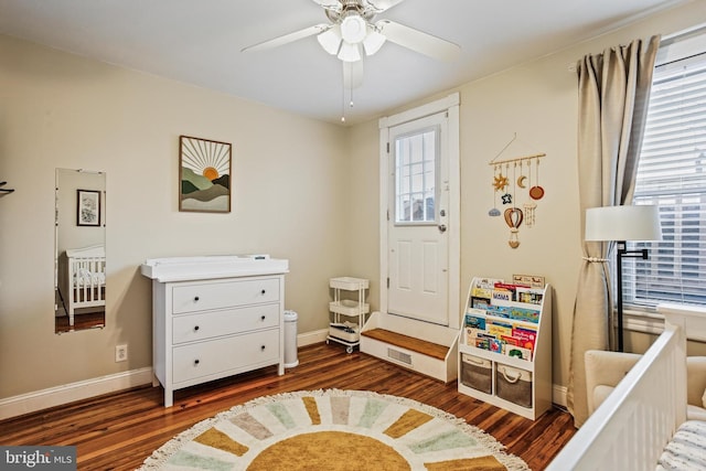 268 S E Ave, Baltimore, MD 21224 - bedroom with dark wood-style floors and a ceiling fan
