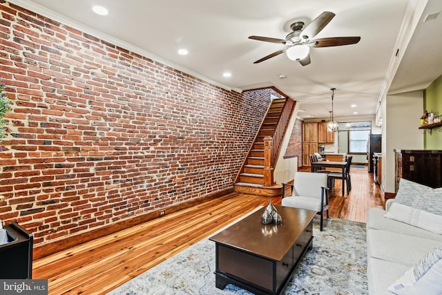 268 S E Ave, Baltimore, MD 21224 - living room with brick wall, light wood-type flooring, ceiling fan, recessed lighting, and crown molding