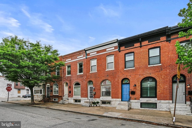 268 S E Ave, Baltimore, MD 21224 - townhome / multi-family property with entry steps and brick siding
