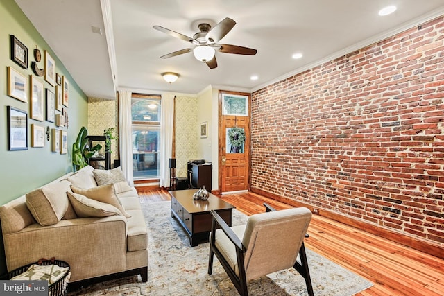 268 S E Ave, Baltimore, MD 21224 - living area featuring wood finished floors, brick wall, ceiling fan, crown molding, and recessed lighting