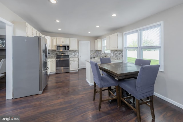 119 Field, Penns Grove, NJ 08069 - dining area featuring recessed lighting, dark wood finished floors, and baseboards