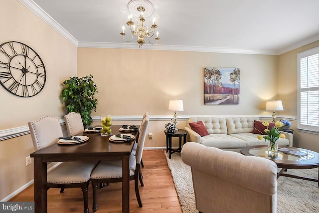 11431 Heritage Commons Way, Reston, VA 20194 - living area featuring ornamental molding, a chandelier, wood finished floors, healthy amount of natural light, and baseboards
