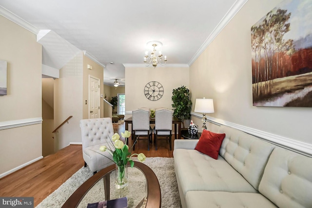 11431 Heritage Commons Way, Reston, VA 20194 - living area with wood finished floors, crown molding, a chandelier, and a ceiling fan