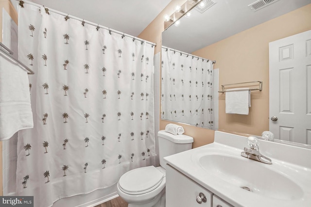 11431 Heritage Commons Way, Reston, VA 20194 - bathroom featuring vanity, toilet, and shower / bath combination with curtain