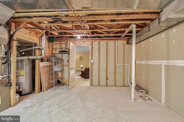 11431 Heritage Commons Way, Reston, VA 20194 - unfinished below grade area featuring gas water heater and carpet