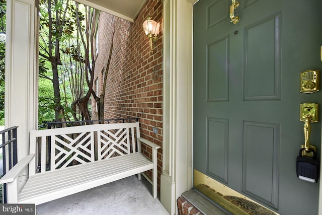 11431 Heritage Commons Way, Reston, VA 20194 - view of exterior entry featuring brick siding and covered porch