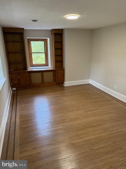 639 Old Airport Rd, Douglassville, PA 19518 - spare room with wood finished floors and baseboards