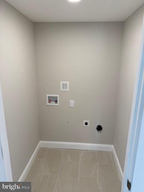 639 Old Airport Rd, Douglassville, PA 19518 - laundry area with electric dryer hookup, washer hookup, and baseboards