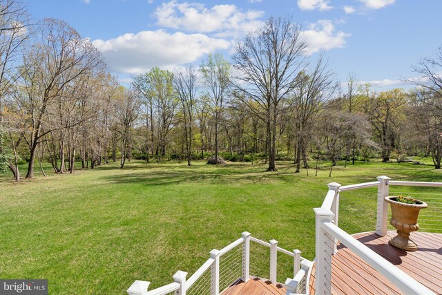 view of yard with a deck