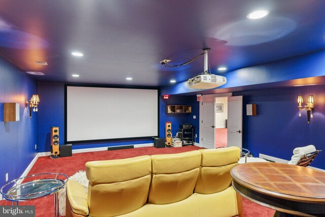 cinema room with recessed lighting and baseboards