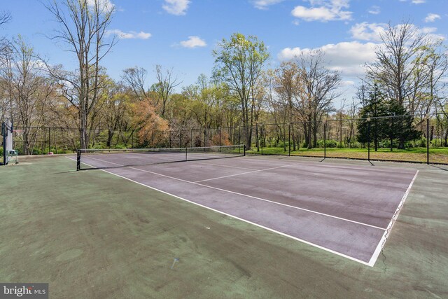 view of sport court featuring fence and community basketball court