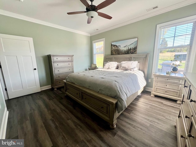 bedroom featuring dark wood-style flooring, visible vents, baseboards, and ornamental molding