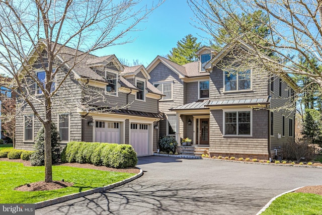528 Prospect Ave, Princeton, NJ 08540 - shingle-style home featuring an attached garage, roof with shingles, driveway, and a front yard