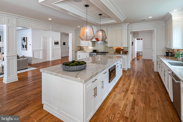 528 Prospect Ave, Princeton, NJ 08540 - kitchen featuring crown molding, white cabinets, tasteful backsplash, and stainless steel appliances