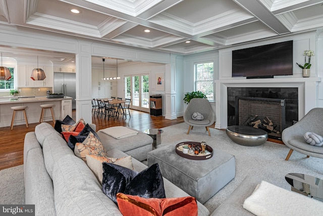 528 Prospect Ave, Princeton, NJ 08540 - living room with a decorative wall, ornamental molding, beam ceiling, and wood finished floors
