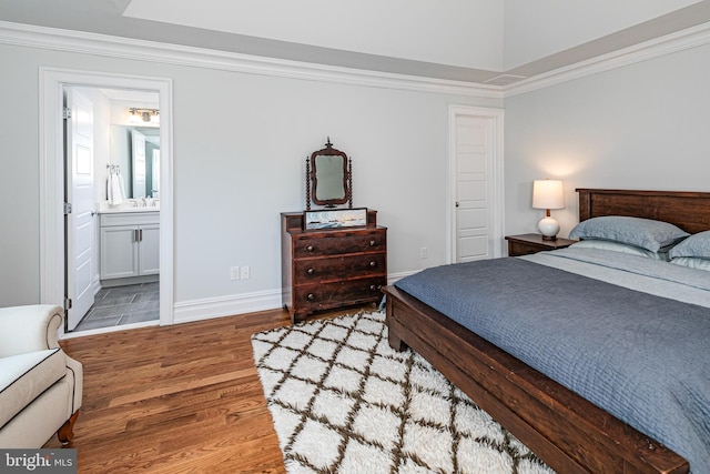 528 Prospect Ave, Princeton, NJ 08540 - bedroom featuring crown molding, wood finished floors, a sink, and baseboards