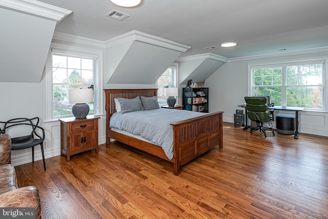 528 Prospect Ave, Princeton, NJ 08540 - bedroom with wood finished floors, ornamental molding, lofted ceiling, and visible vents