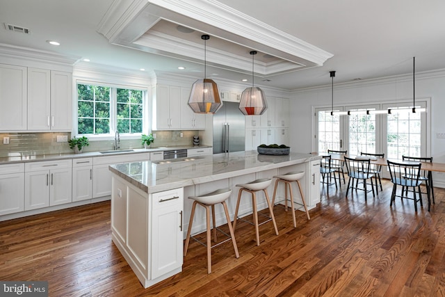 528 Prospect Ave, Princeton, NJ 08540 - kitchen with ornamental molding, visible vents, and stainless steel built in fridge