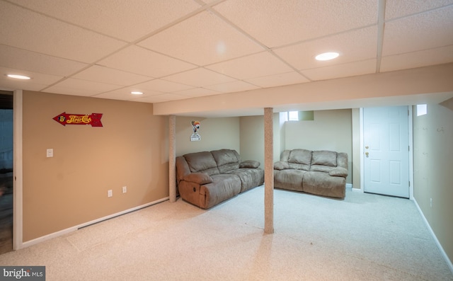 living area with baseboards, recessed lighting, a paneled ceiling, and carpet