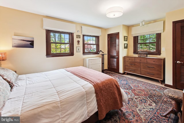 bedroom featuring wood finished floors