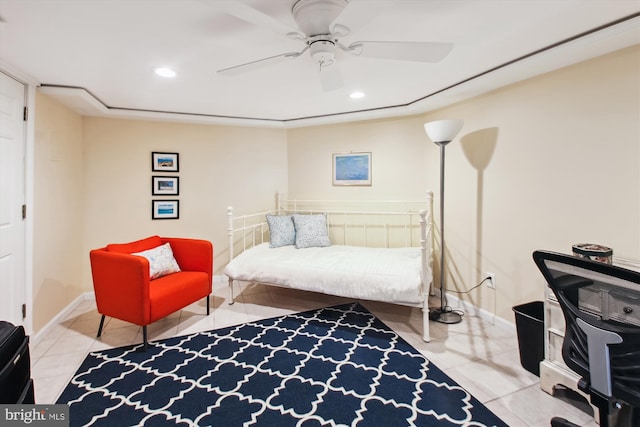 interior space with tile patterned flooring, a ceiling fan, baseboards, and recessed lighting