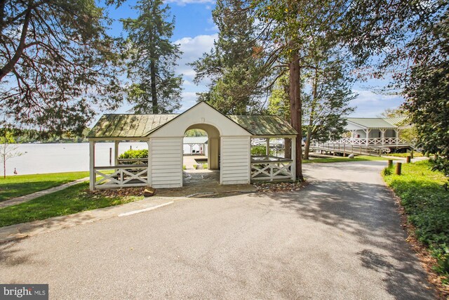exterior space with aphalt driveway