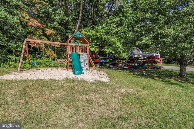 view of jungle gym with a yard