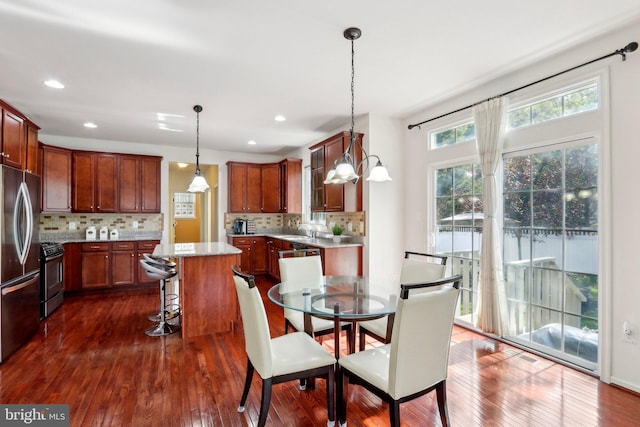 dining room featuring visible vents, recessed lighting, and dark wood-style flooring