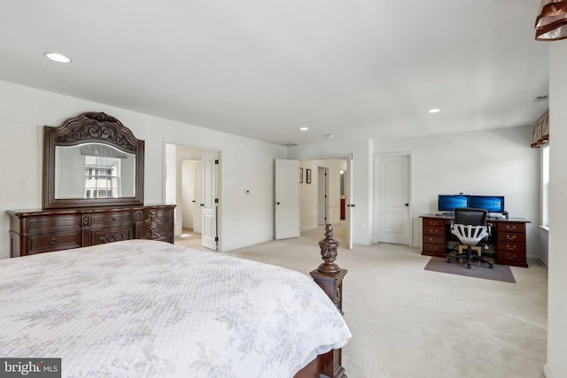 bedroom with recessed lighting and light carpet