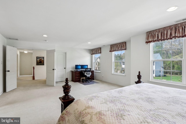 carpeted bedroom featuring visible vents and recessed lighting