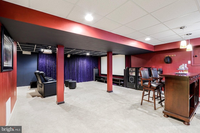 interior space featuring recessed lighting, visible vents, carpet, a dry bar, and a drop ceiling