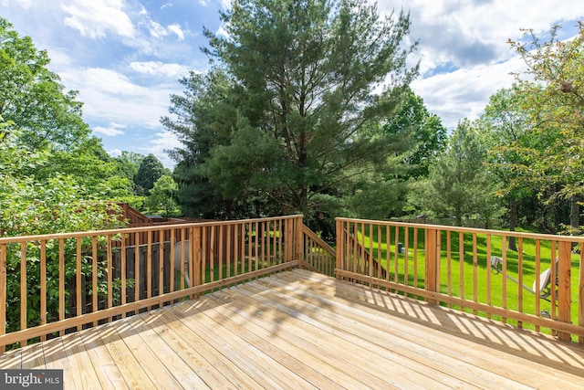 3502 Dartmoor Ln Unit 30, Olney, MD 20832 - wooden deck with a yard and view of scattered trees