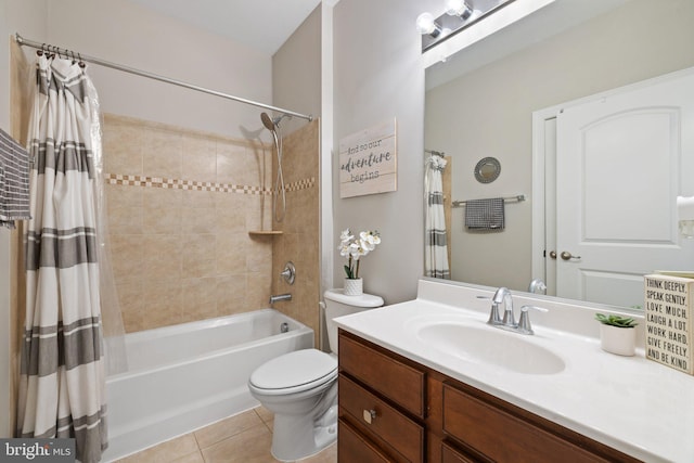 full bath with tile patterned floors, vanity, toilet, and shower / bath combination with curtain