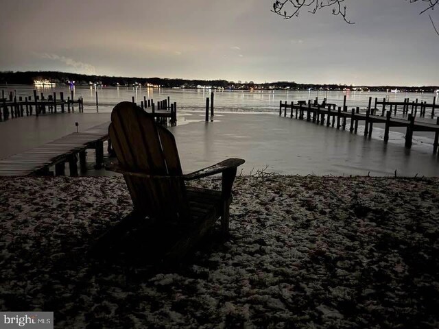 view of dock with a water view